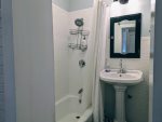 Clean, Pristine, and Ready for a Quick Steam - The Main Level Bathroom on the West Side